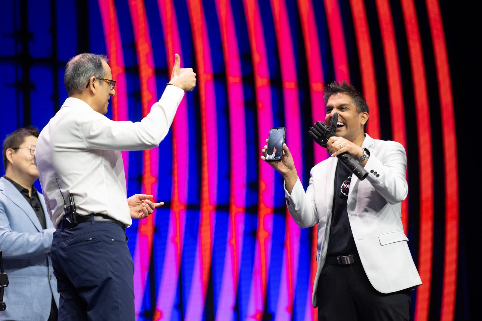 Psyonic CEO Aadeel Akhtar showed off his company’s robotic hand on stage at 3DExperience World 2026. (Image: Dassault Systèmes.)