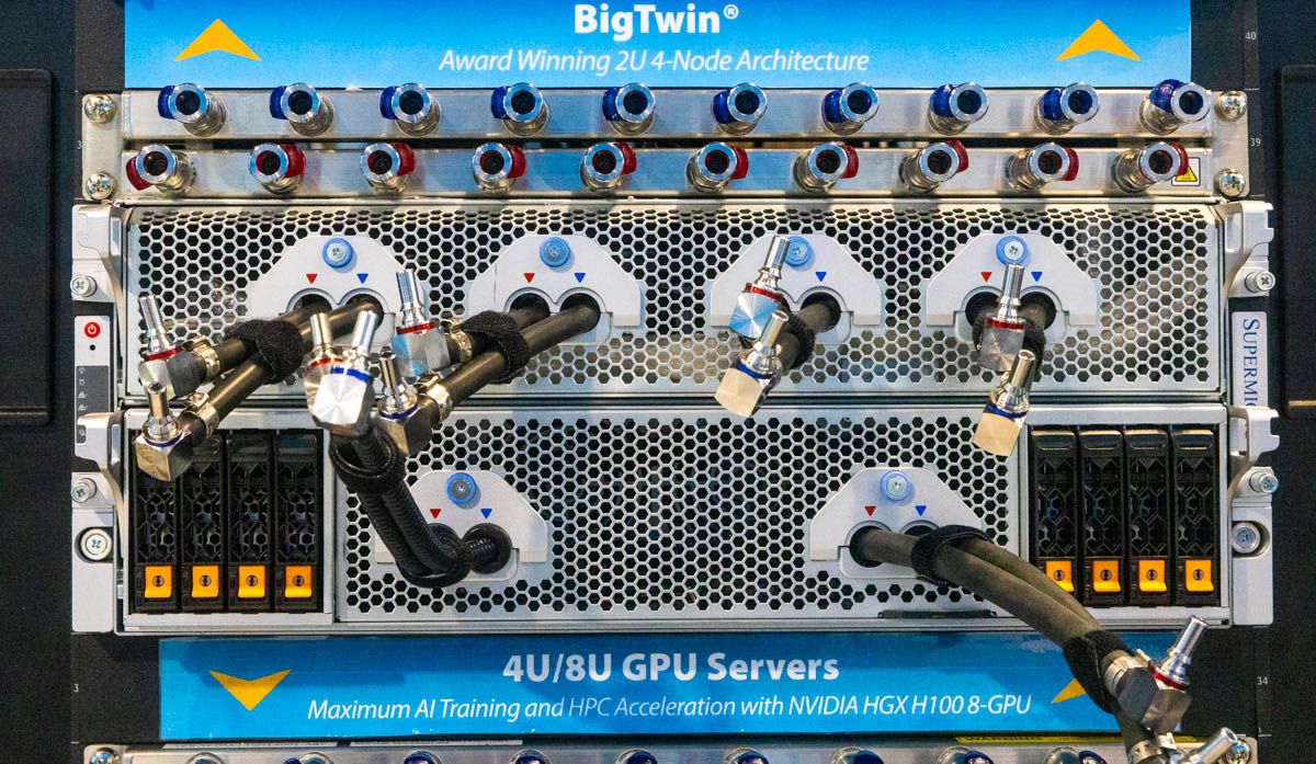 Figure 3. A liquid-cooled GPU server with integrated quick-disconnect fittings and manifold connections for high-density AI training workloads. These connectors are engineered to support safe, high-throughput cooling in systems such as the NVIDIA HGX H100 platform. (Image: Supermicro)