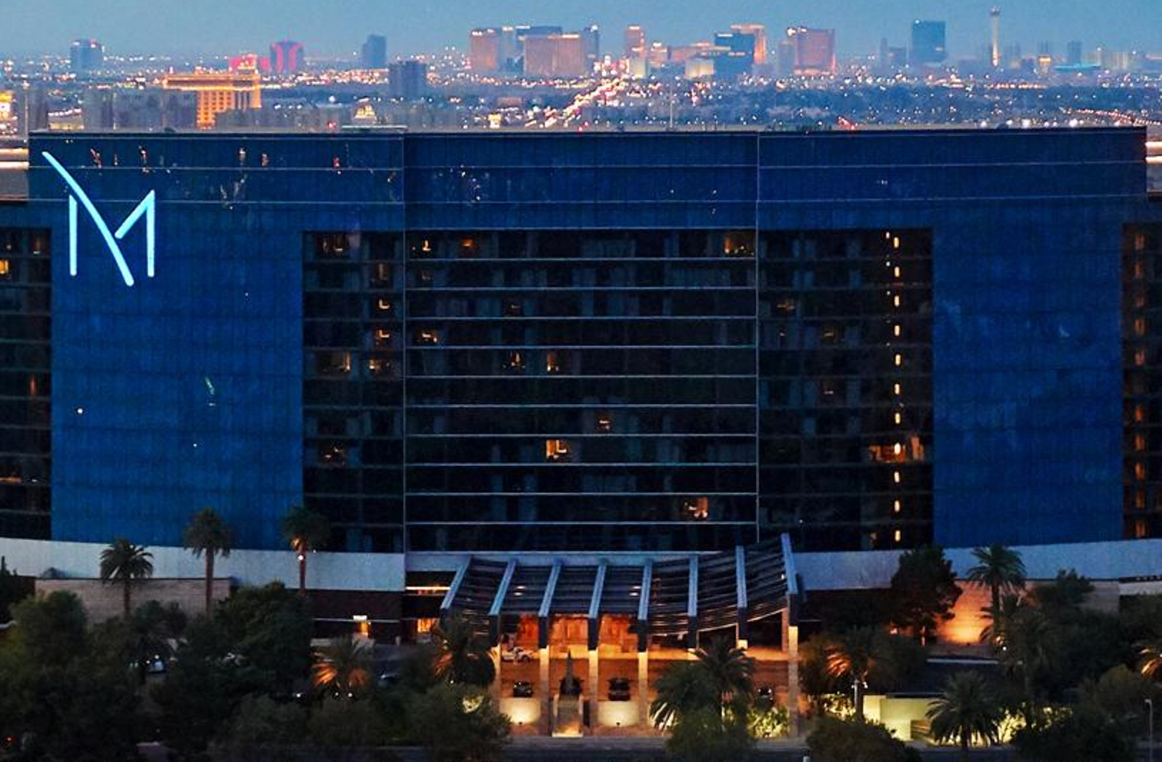 M Resort Spa Casino at dusk with the Las Vegas Strip skyline in the background